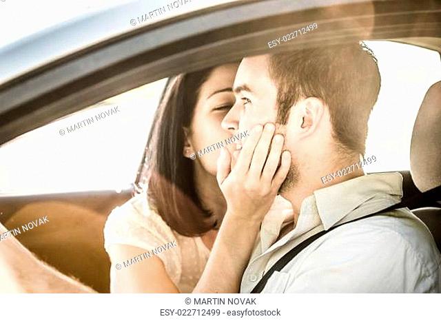 Big kiss in car