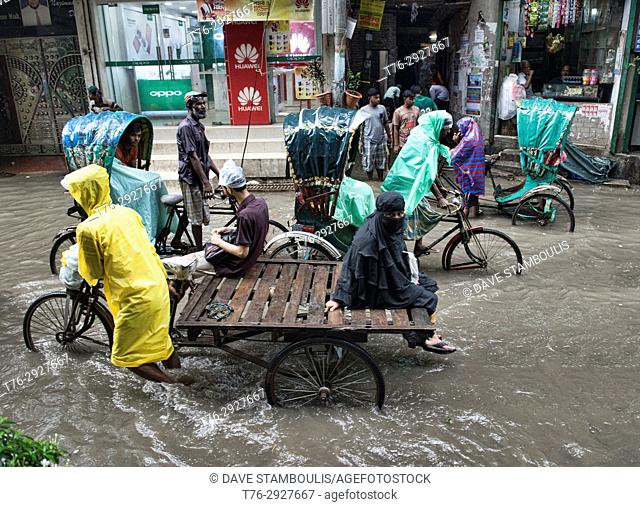 Rickshaws in the monsoon, Dhaka, Bangladesh