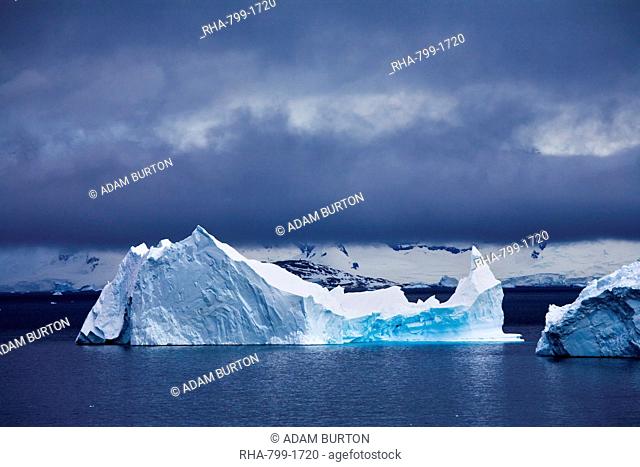 Iceberg drifting off the Antarctic Peninsula, Antarctica, Polar Regions
