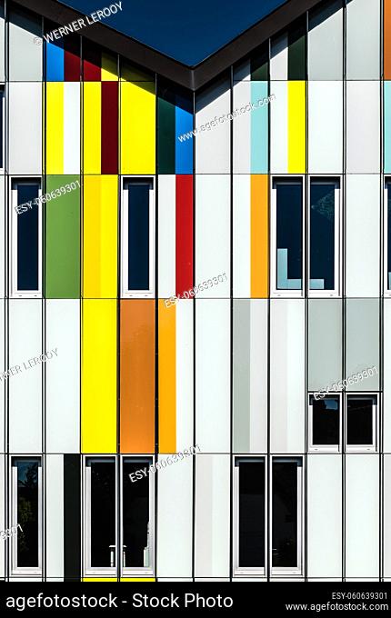 Dilbeek, Flemish Brabant Region, Belgium - 7 2 2021: abstract colors and lines from the facade of a contemporary music school building