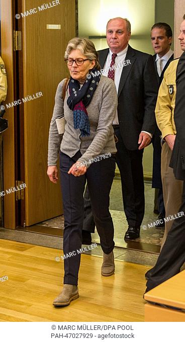 Defendant Uli Hoeness (C), the president of German soccer club FC Bayern Munich, his wife Susanne (L) and his lawyer Bernd Gross (R) arrive in the courtroom on...