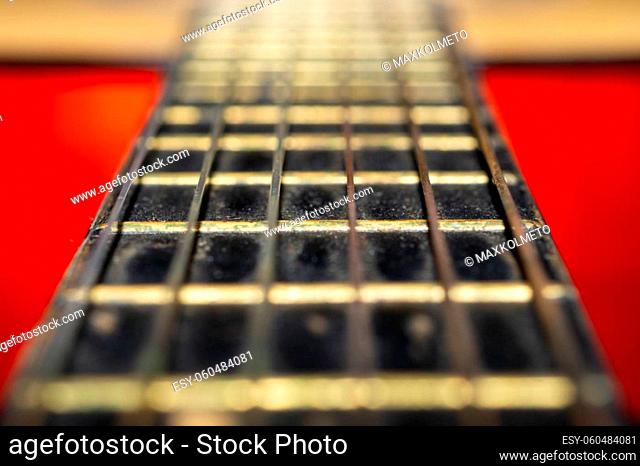 Acoustic guitar neck close up. guitar strings macro. musical instrument
