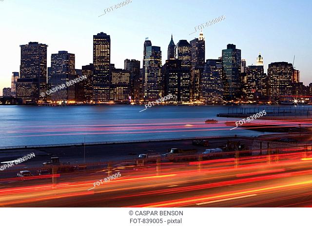 Traffic and cityscape at dusk, Manhattan, New York City, NY, USA