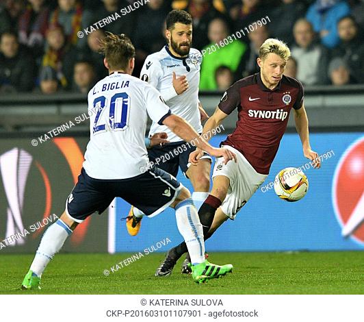 From left: Lucas Biglia and Antonio Candreva of Lazio and Ladislav Krejci of Sparta in action during the European Football League group of sixteen opening match...