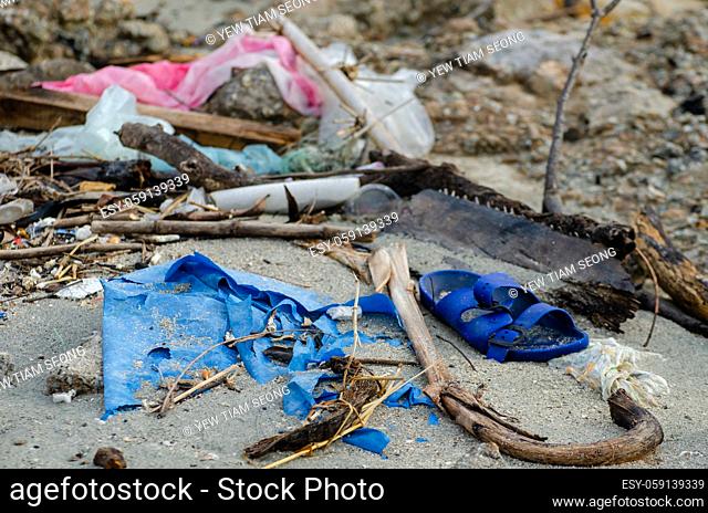 Rubbish plastic, sandals rubbish at sea coastal