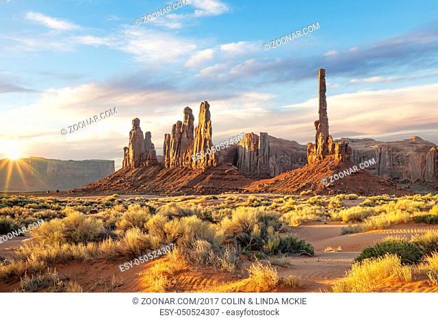 Spires and Cliffs in Monument Valley. The tallest spire is the Totem Pole, which has been used in many movies