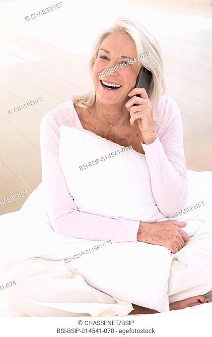 Senior woman telephoning
