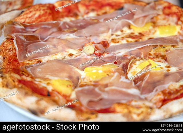 homemade pizza with eggs and ham