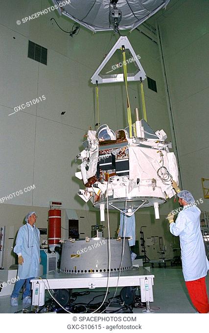 07/22/1997 --- Applied Physics Laboratory engineers and technicians from Johns Hopkins University assist in guiding the Advanced Composition Explorer ACE as it...