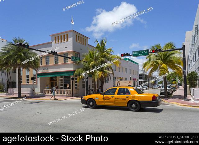Ocean Drive, yellow cab and Art Deco architecture, Miami Beach, Miami, Florida, United States of America, North America