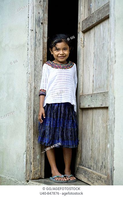 Guatemala, Rio Dulce, 7 year old girl posing