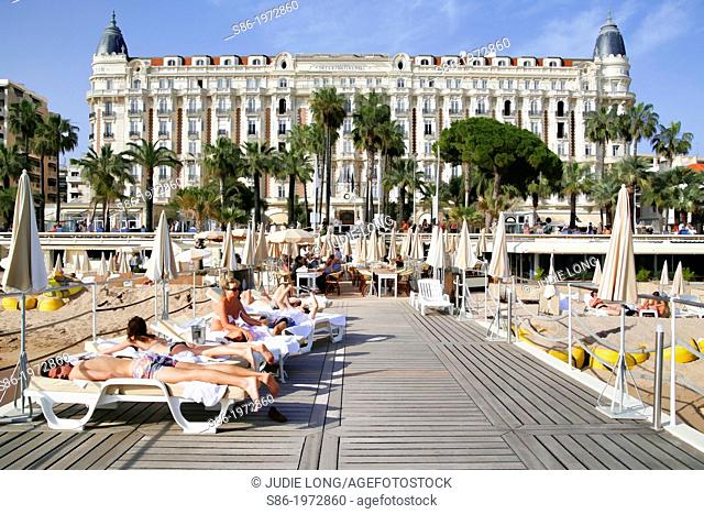 Guests on the Beach Pier of the Carlton Intercontinental Hotel, Cannes, French Riviera, France
