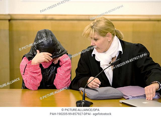 05 February 2019, Lower Saxony, Osnabrück: The defendant (l), who is accused, among other things, of ill-treatment of persons under protection and deprivation...