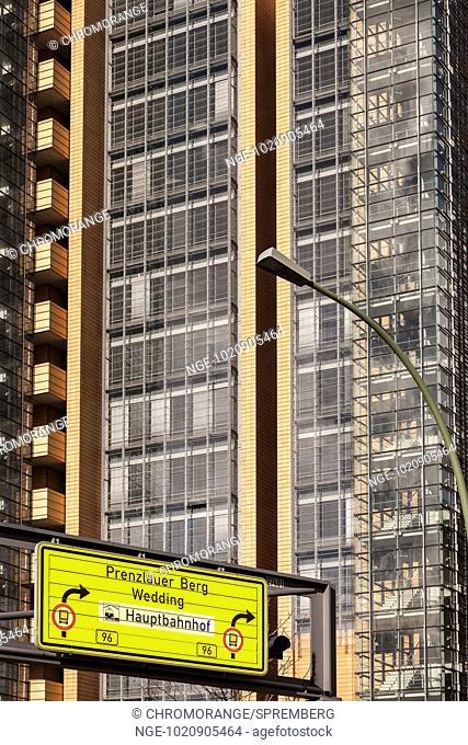 Traffic sign in front of a high-rise building