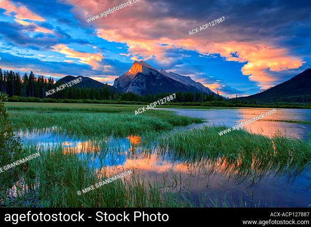 Clouds and Mt. Rundle reflected in Vermillion Lakes at sunrise Banff National Park Alberta Canada