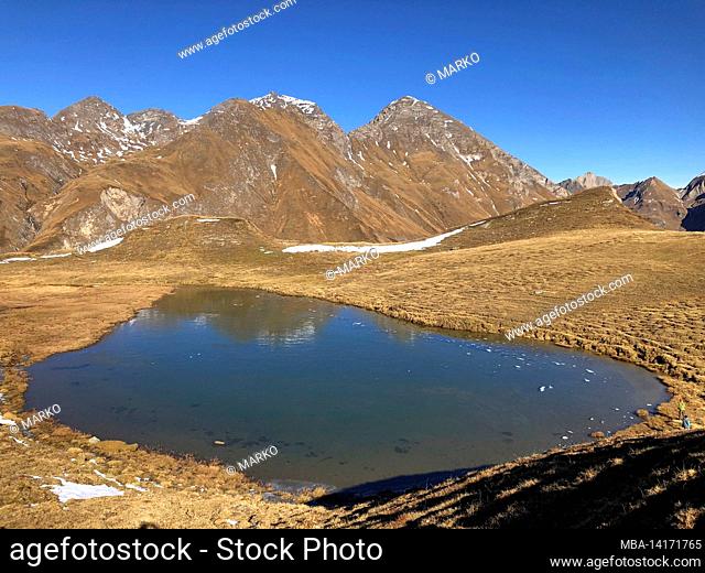 autumn landscape at the marblsee above the fanealm in south tyrol, fane almdorf, malga fane, valsertal, dolomites, brixen, vals, south tyrol, italy