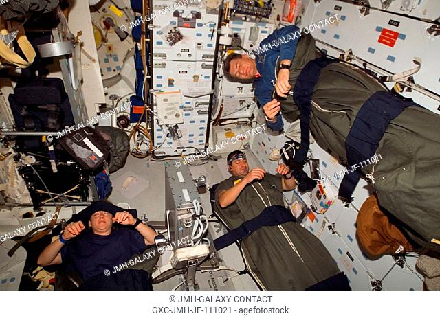 Astronauts Pam Melroy (left), STS-120 commander; George Zamka (bottom right), pilot; and European Space Agency's (ESA) Paolo Nespoli, mission specialist