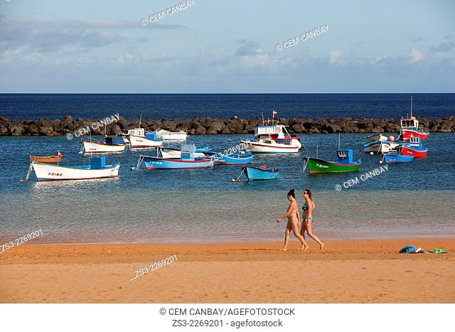 Women in bikini walking on the beach, Playa de las Teresitas beach, Santa Cruz, Tenerife, Canary Islands, Spain, Europe