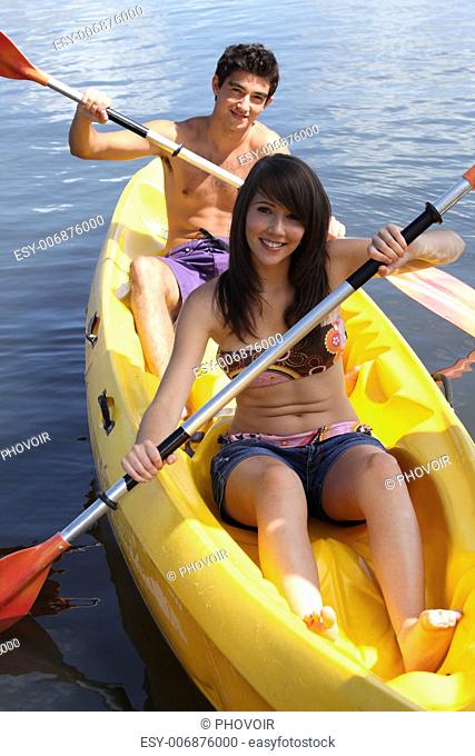 young couple canoeing