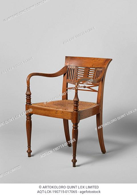 Armchair made of teak and rattan covered seat, so-called 'Raffles' chair, Armchair made of teak with rattan covered seat ('Raffles chair')