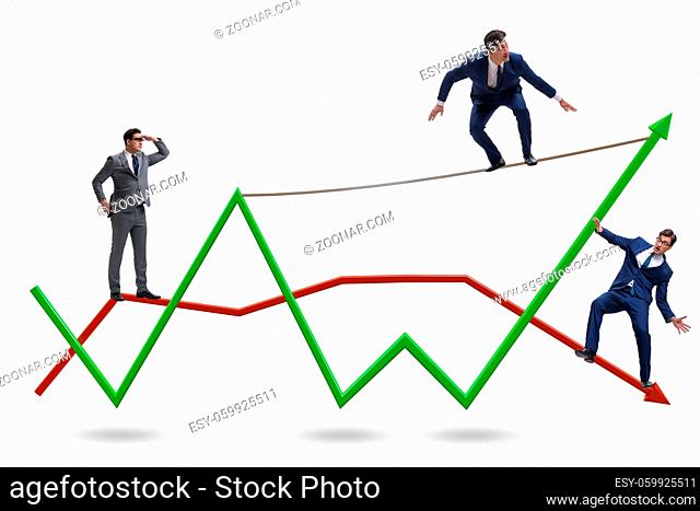 Businessman balancing on tightrope on the line chart