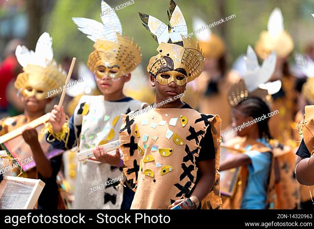 Cleveland, Ohio, USA - June 8, 2019: Parade the Circle, children wearing african style clothing playing the drums