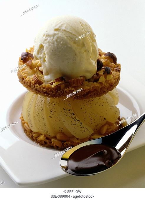vanilla-flavored pear and hazelnut shortbread biscuit with vanilla ice cream