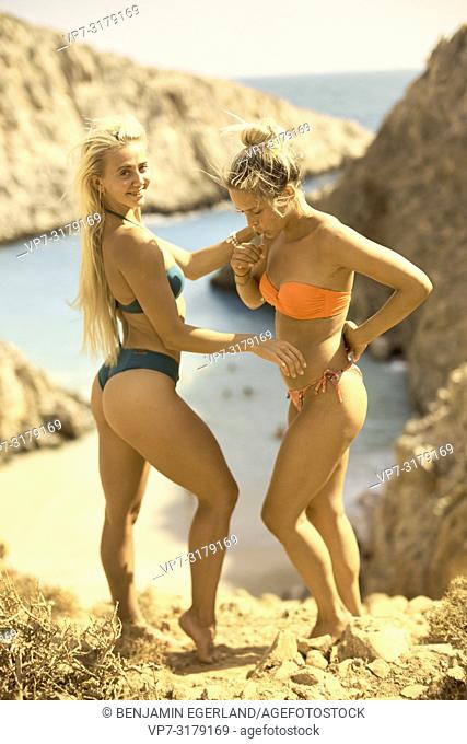 two women at Seitan Limania Beach, Crete, Greece