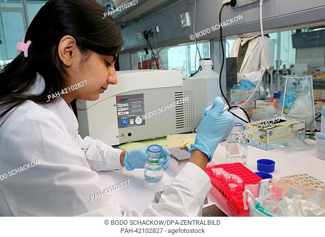 Doctoral student Seerat Bajwa from Pakistan isolates stem cells of mice in a laboratory at the Leibniz institute for research into aging Jena, Germany