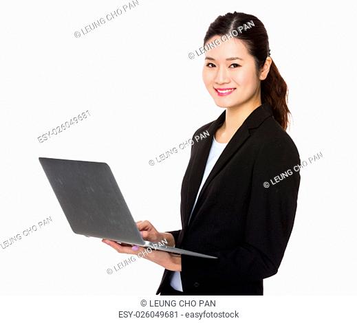 Businesswoman use of the notebook computer