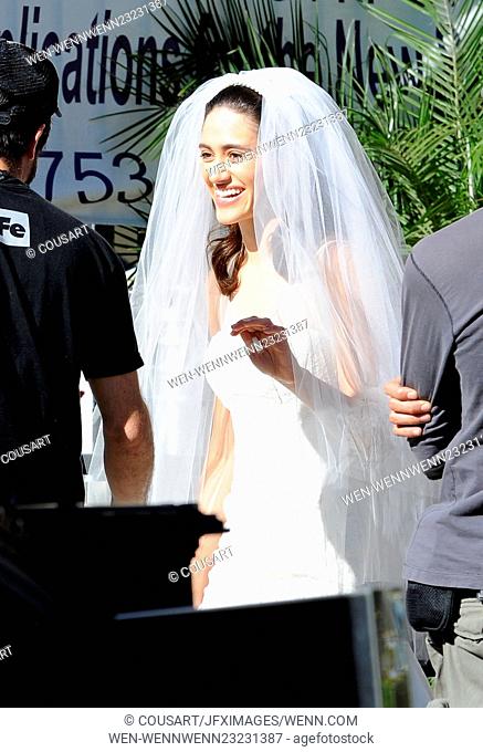 Actress Emmy Rossum looking flawless in a wedding dress as she filming a wedding scene her hit tv show ""Shameless"" filming in Los Angeles Ca