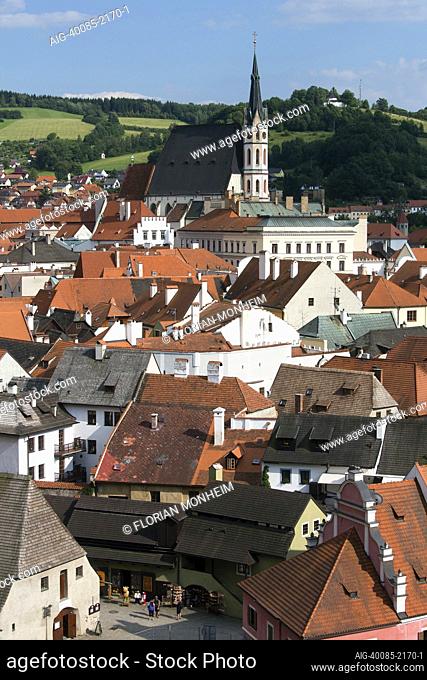 Gothic St. Vitus church in the distance above roofs of the old town, Cesky Krumlov, South Bohemia, Czech Republic