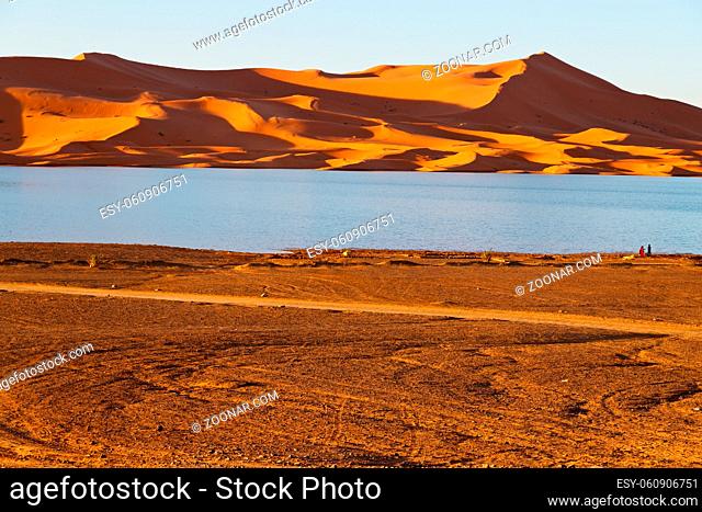 sunshine in the desert of morocco sand and lake    dune
