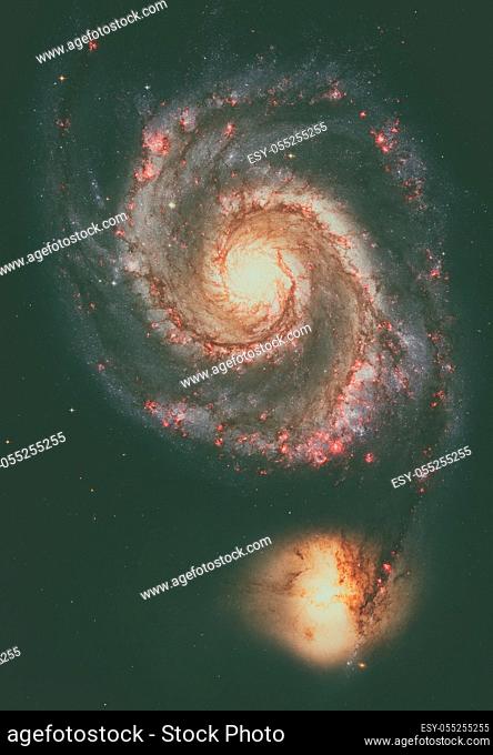 Whirlpool Galaxy and Companion. Winding arms of the spiral galaxy M51 or NGC 5194 appear like a grand spiral staircase sweeping through space