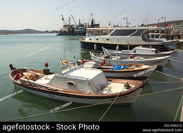 View to the traditional fishing boats anchored at the port of Cunda or so-called Alibey Island-Alibey Adasi, Ayvalik, Balikesir City, Aegean Region, Turkey