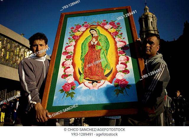 Pilgrims carry an image of the Our Lady of Guadalupe in Mexico City, December 10, 2010  Hundreds of thousands of Mexican pilgrims converged on the Our Lady of...