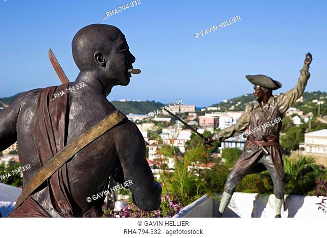 Sculpture in Blackbeard's Castle, one of four National Historic sites in the US Virgin Islands, with Charlotte Amalie in the background, St. Thomas, U