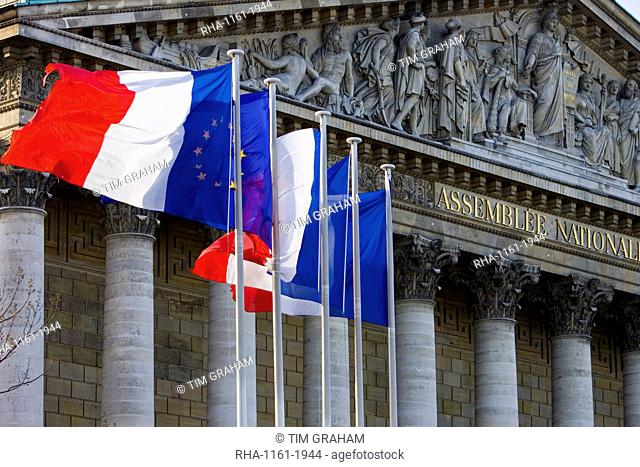 Flags fly on flagpoles outside AssemblÃ©e Nationale, Palais Bourbon, Central Paris, France