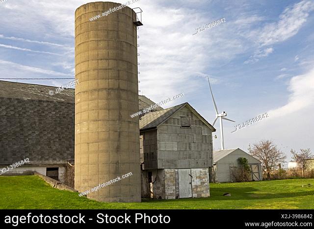 Pigeon, Michigan - A wind turbine, part of the Harvest II Wind Project, near a barn in the Thumb of Michigan