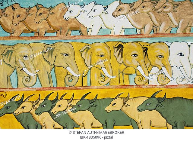 Theravada Buddhism, naive murals with cattle, elephants and water buffalo at a temple, Octagonal Pavilion of Jingzhen, near Menghai in Jinghong
