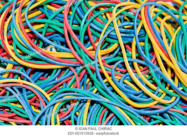 Background with a pile of colorful rubber elastics