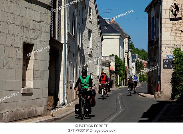 CYCLISTS TOURING THE STREETS OF CANDES-SAINT-MARTIN, 'LOIRE A VELO' CYCLING ITINERARY, INDRE-ET-LOIRE 37, FRANCE
