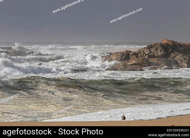 Rocky beach during rough sea day