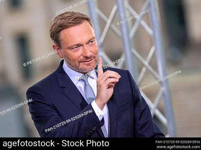 25 July 2021, Berlin: Christian Lindner, party leader of the FDP, speaks at the ARD summer interview on the terrace of the Marie-Elisabeth-Lüders-Haus