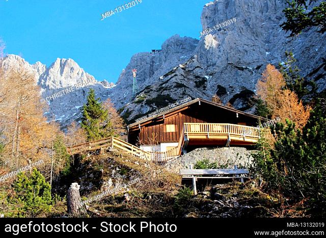 Mittenwald hut with a new terrace in the sunset