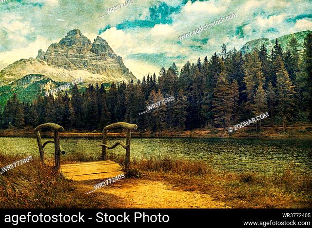 wooden bridge on lake in south tyrol, Three Peaks
