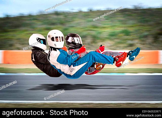 Concept image of racing drivers in racing position with complete gear