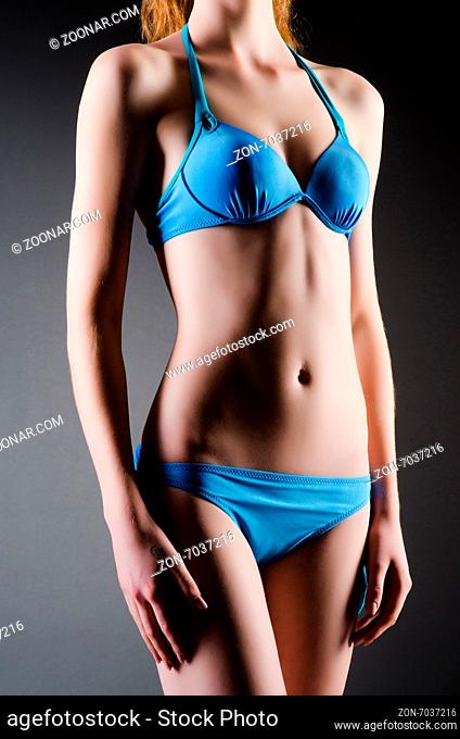 Attractive woman in blue bikini