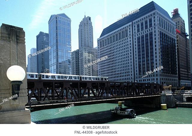 Tram on bridge across river, Wacker Drive, Chicago River, Chicago, Illinois, USA