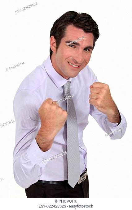 smiling businessman ready for fight